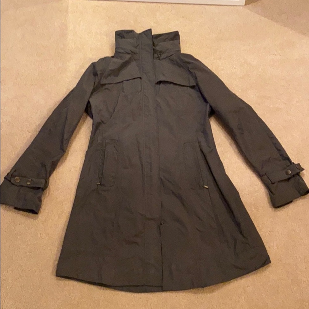 Cole Haan anorak rain jackets with packable hood.